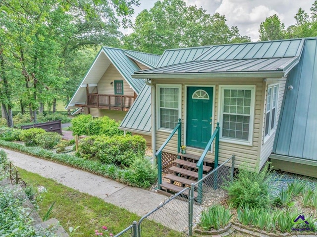 124 Joy Dr, Warner Robins, GA 31088 - exterior space featuring a standing seam roof, entry steps, and metal roof