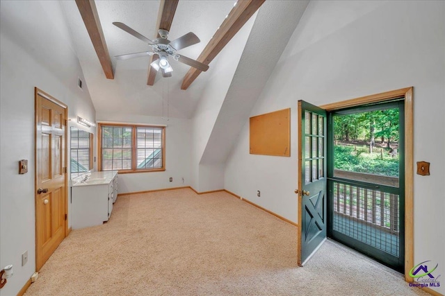 124 Joy Dr, Warner Robins, GA 31088 - additional living space with lofted ceiling with beams, carpet, a ceiling fan, baseboards, and visible vents
