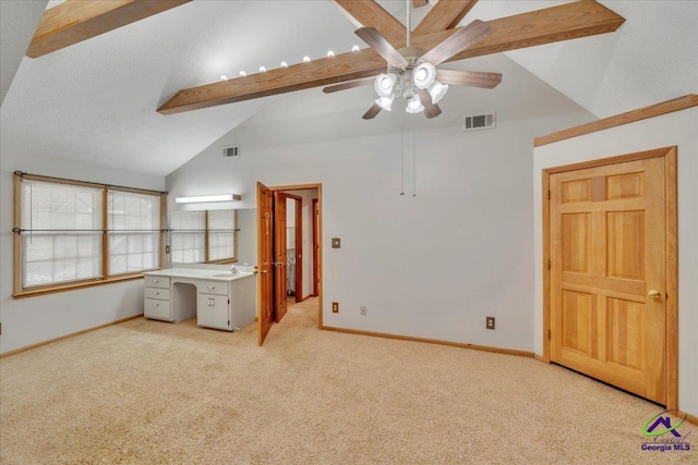 124 Joy Dr, Warner Robins, GA 31088 - unfurnished bedroom featuring beamed ceiling, visible vents, and light carpet