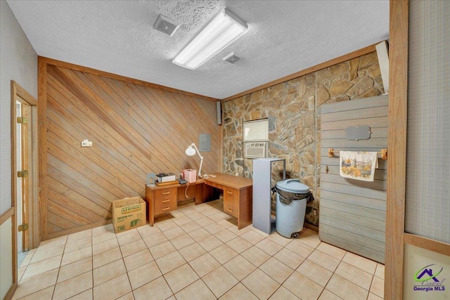 124 Joy Dr, Warner Robins, GA 31088 - office space with light tile patterned flooring, wood walls, a textured ceiling, and visible vents