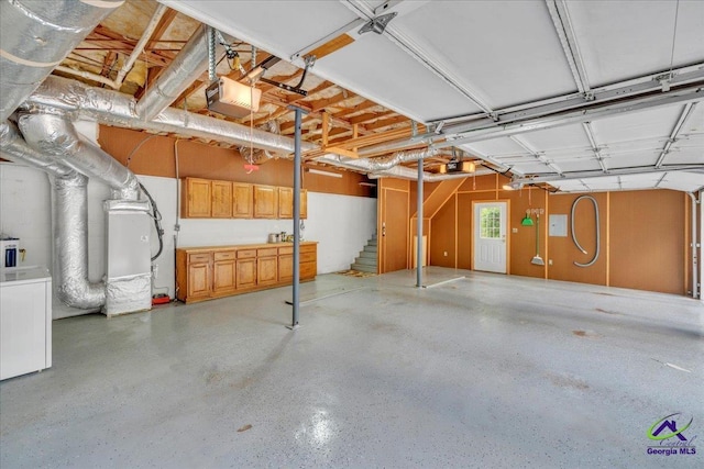 124 Joy Dr, Warner Robins, GA 31088 - garage with a garage door opener and washer / clothes dryer
