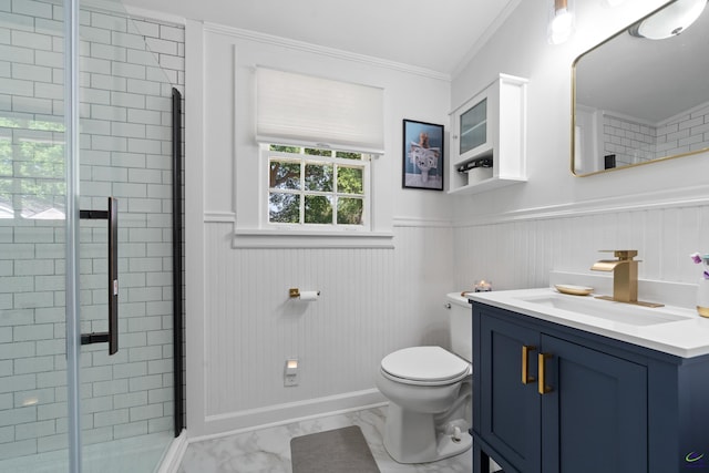 bathroom featuring crown molding, vanity, marble finish floor, toilet, and a stall shower