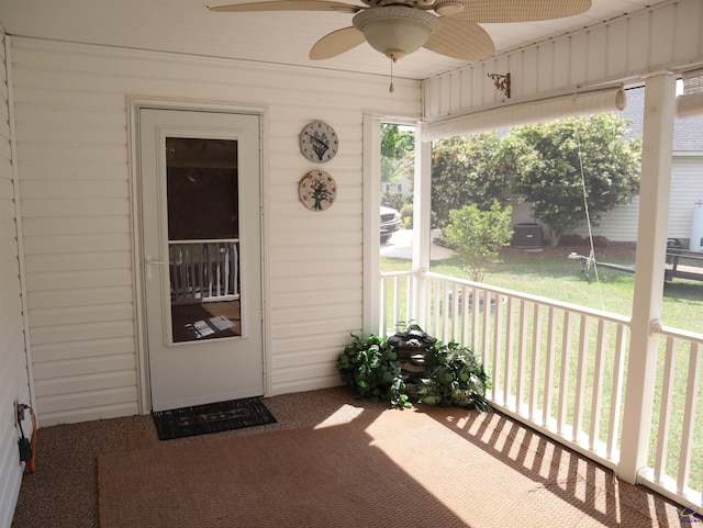 sunroom / solarium with ceiling fan