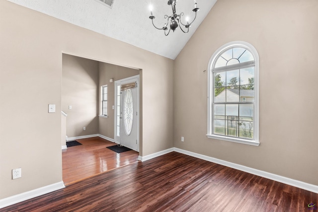 203 York Ln, Macon, GA 31220 - entryway featuring baseboards, wood finished floors, a notable chandelier, and high vaulted ceiling