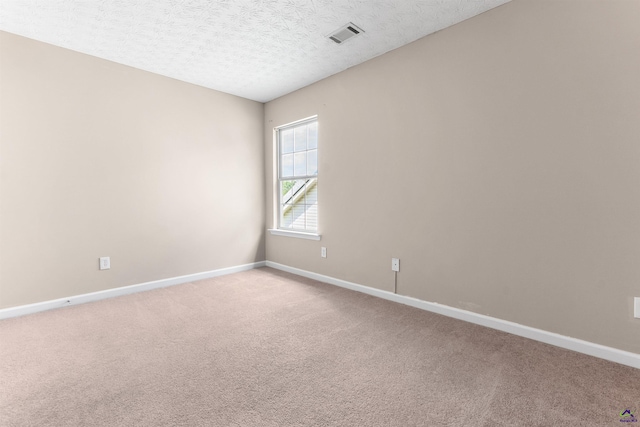 203 York Ln, Macon, GA 31220 - empty room featuring baseboards, visible vents, and light colored carpet