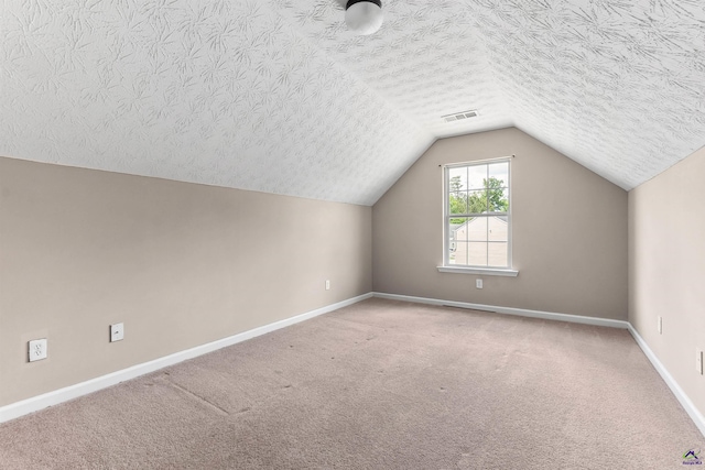 203 York Ln, Macon, GA 31220 - bonus room featuring visible vents, carpet, a textured ceiling, and baseboards