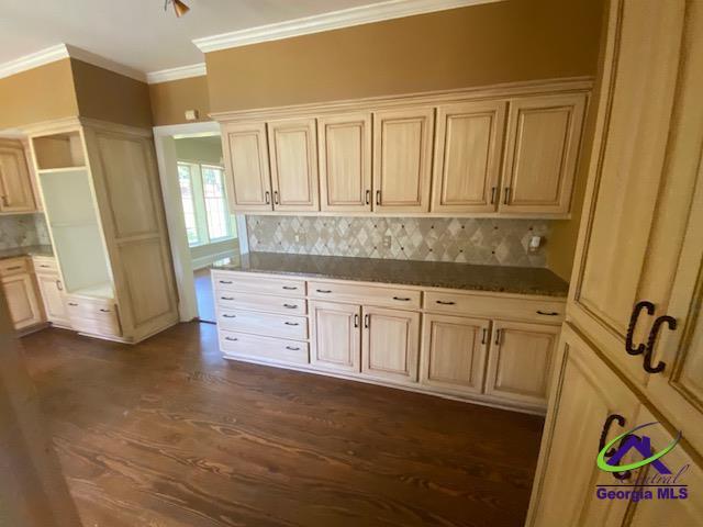 1218 Nottingham Dr, Macon, GA 31210 - kitchen with decorative backsplash, open shelves, dark wood-style floors, and ornamental molding