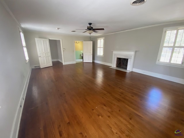 1218 Nottingham Dr, Macon, GA 31210 - unfurnished living room featuring crown molding, a ceiling fan, visible vents, and a fireplace with flush hearth