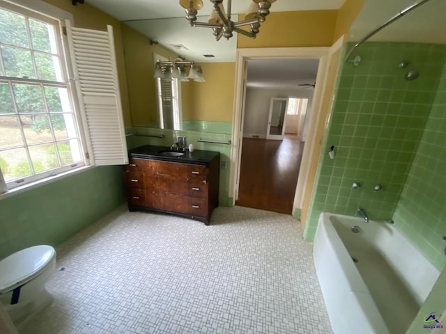 1218 Nottingham Dr, Macon, GA 31210 - bathroom featuring an inviting chandelier, bathtub / shower combination, toilet, and vanity