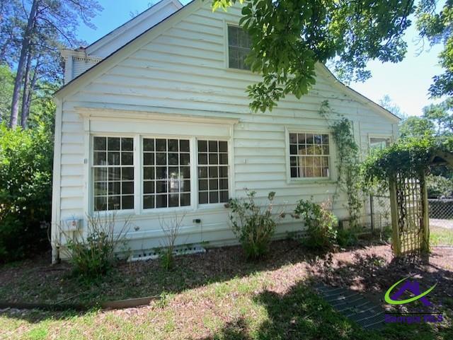 1218 Nottingham Dr, Macon, GA 31210 - view of side of property featuring fence