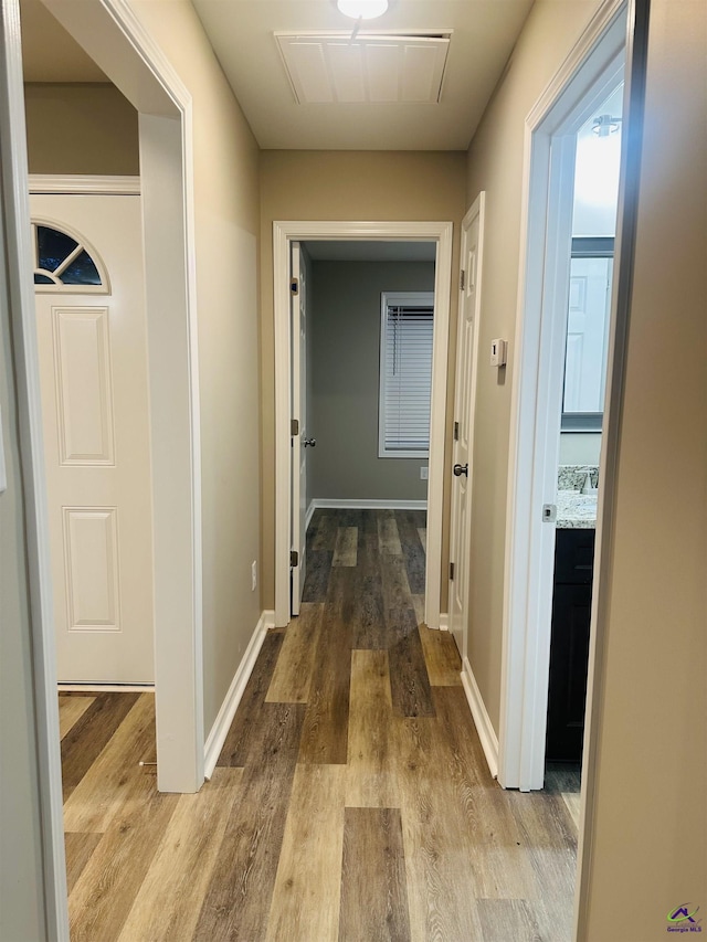325 Peach Cir, Fort Valley, GA 31030 - corridor with wood finished floors and baseboards