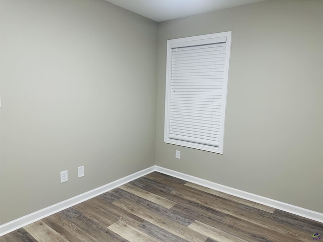 325 Peach Cir, Fort Valley, GA 31030 - unfurnished room with dark wood-type flooring and baseboards