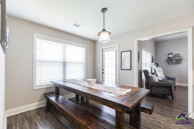 122 Milford Cir, Perry, GA 31069 - dining area featuring visible vents, baseboards, and wood finished floors