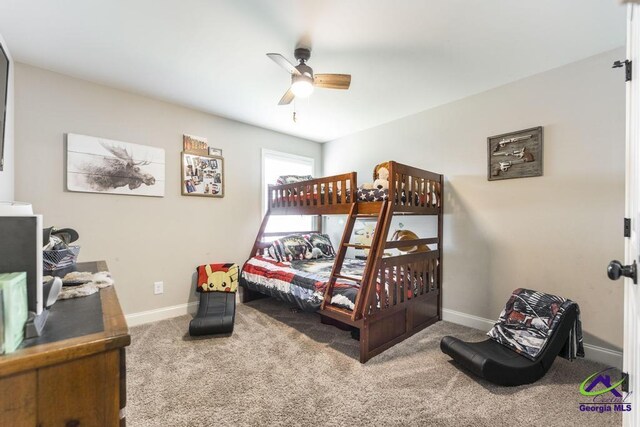 122 Milford Cir, Perry, GA 31069 - bedroom with baseboards, a ceiling fan, and carpet