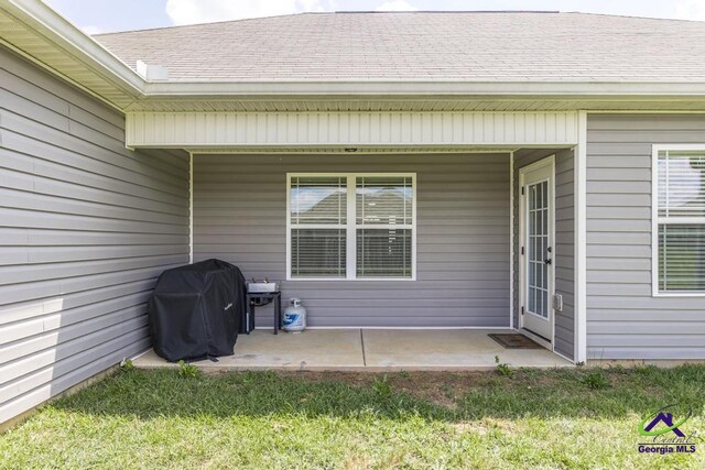 122 Milford Cir, Perry, GA 31069 - property entrance featuring a patio