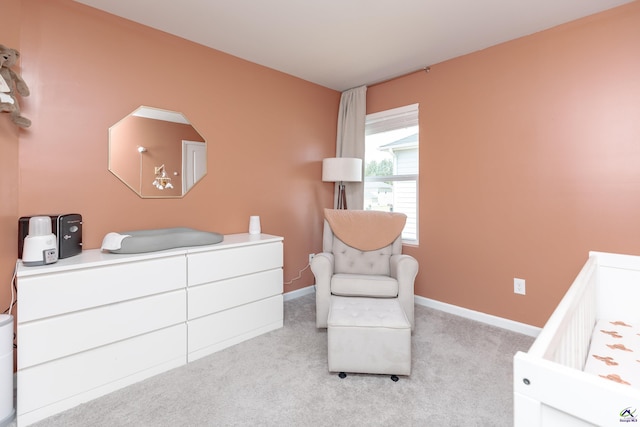 carpeted bedroom with baseboards