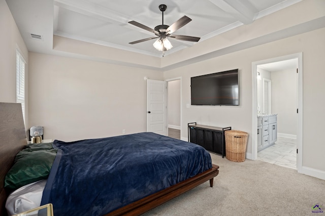 bedroom featuring baseboards, visible vents, ceiling fan, and ensuite bath