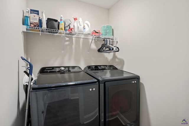 laundry area featuring laundry area and washing machine and dryer