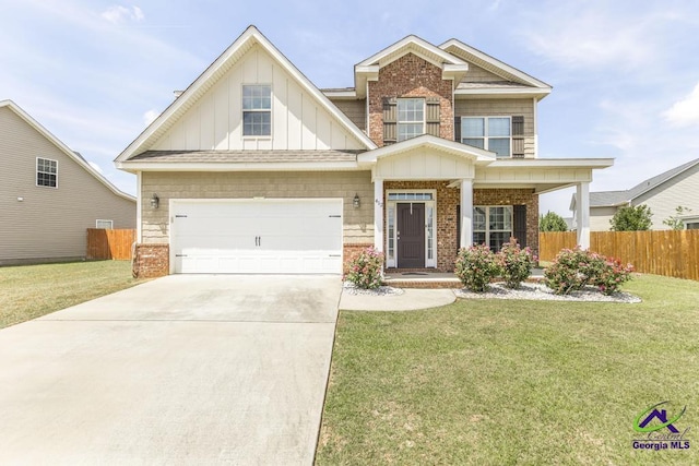 craftsman inspired home featuring brick siding, board and batten siding, fence, and a front yard