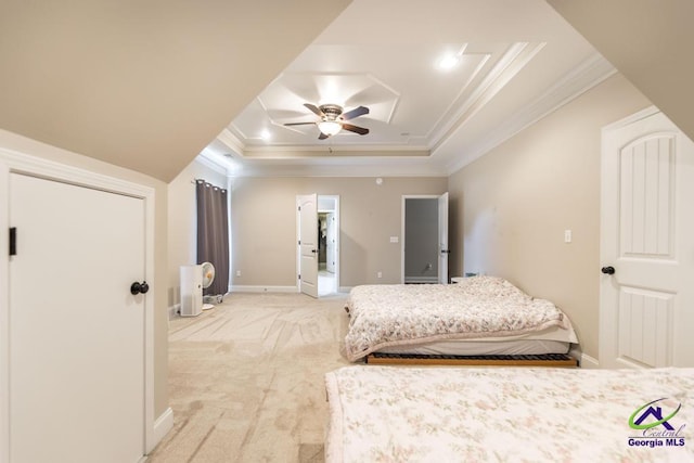 bedroom featuring crown molding, baseboards, light colored carpet, a raised ceiling, and a ceiling fan