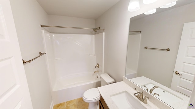 full bathroom with toilet, tile patterned floors, shower / washtub combination, and vanity