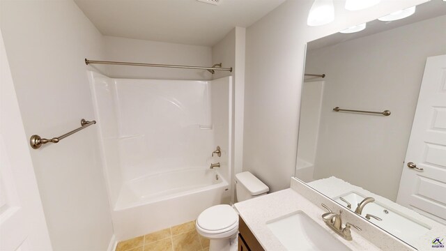 bathroom featuring toilet, shower / washtub combination, and vanity