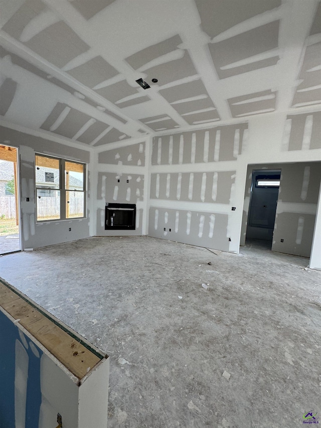 unfurnished living room featuring a fireplace