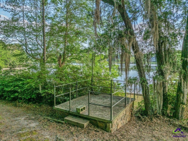 exterior space with a water view