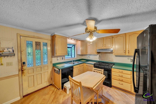kitchen featuring ornamental molding, under cabinet range hood, black appliances, and light brown cabinets