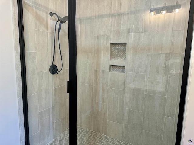 bathroom featuring a shower stall