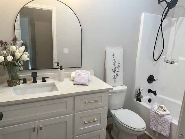 84 Camden Way, Hawkinsville, GA 31036 - bathroom featuring vanity, toilet, and shower / washtub combination
