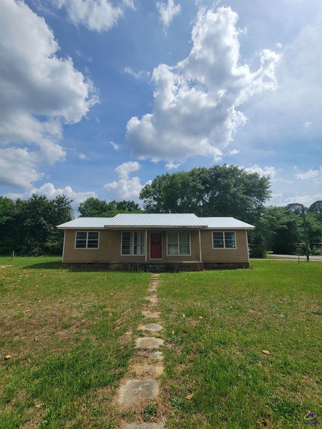 ranch-style house featuring crawl space, a front yard, and metal roof