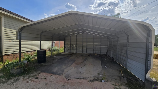 view of vehicle parking featuring a carport