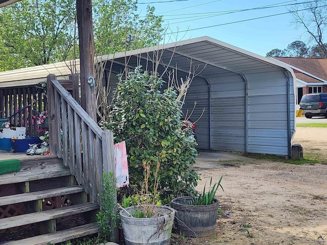 exterior space featuring dirt driveway