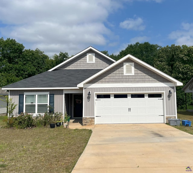 107 Red Tail Cir, Byron, GA 31008 - craftsman-style house with an attached garage, board and batten siding, a front yard, and concrete driveway
