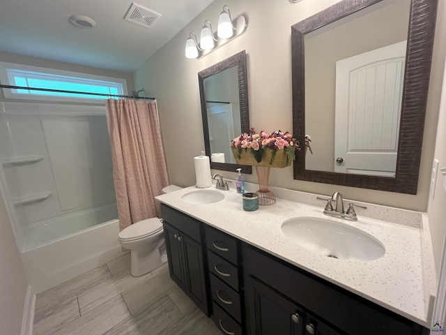 107 Red Tail Cir, Byron, GA 31008 - bathroom with a sink, toilet, double vanity, and visible vents