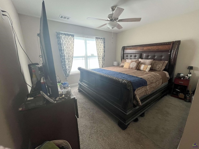 107 Red Tail Cir, Byron, GA 31008 - carpeted bedroom with a ceiling fan and visible vents