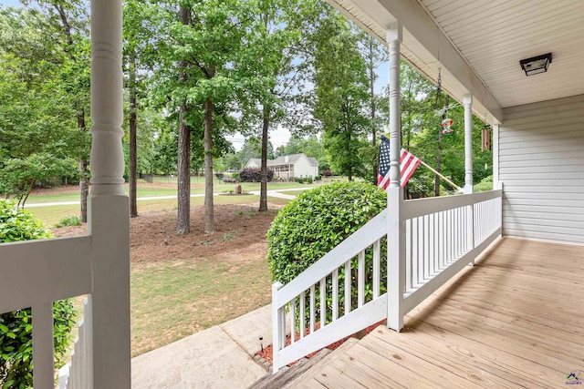 wooden terrace with covered porch