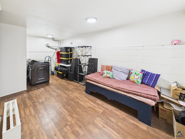 bedroom featuring wood finished floors