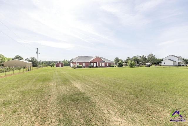 view of yard featuring fence