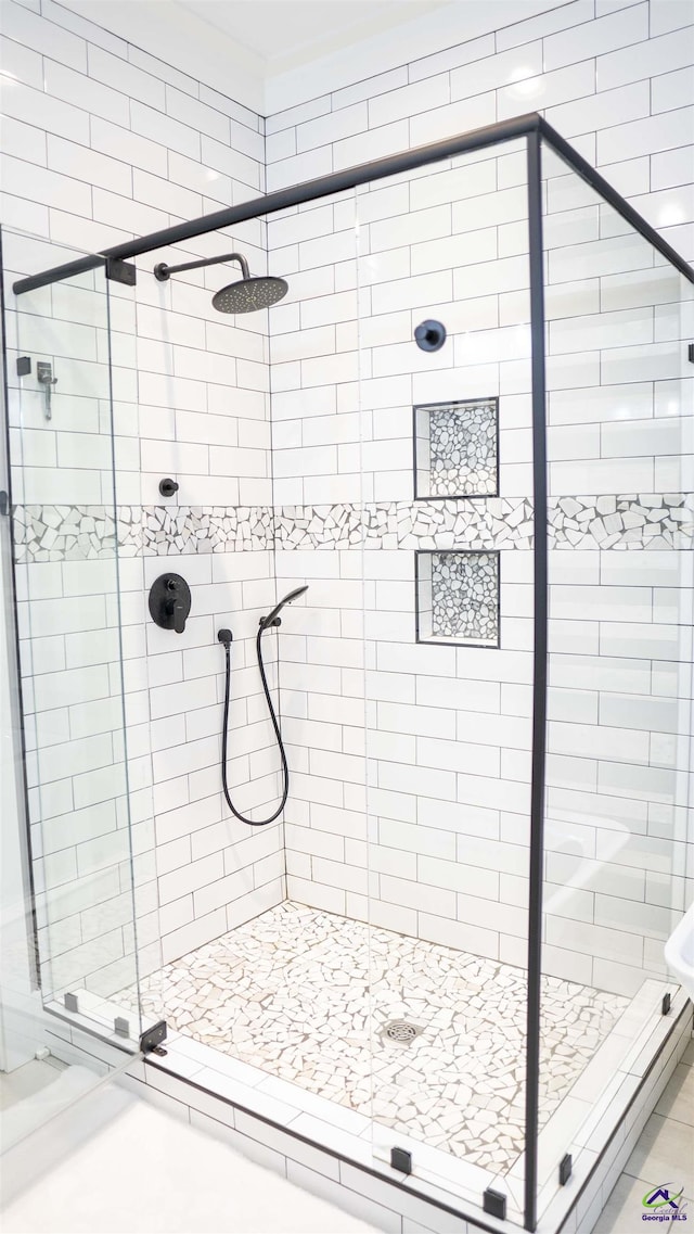 bathroom featuring a stall shower