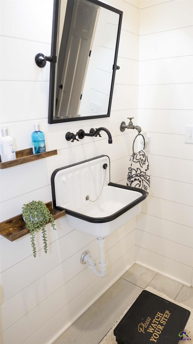 bathroom featuring wood finished floors
