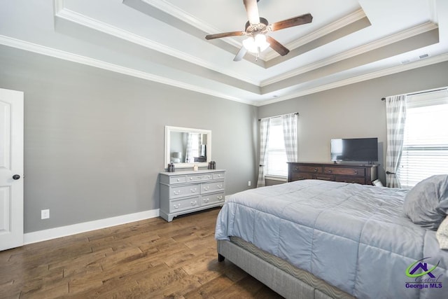 217 Woodlands Blvd, Kathleen, GA 31047 - bedroom featuring a raised ceiling, ornamental molding, wood finished floors, baseboards, and ceiling fan