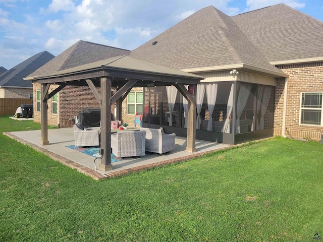 exterior space with a gazebo, fence, and an outdoor living space