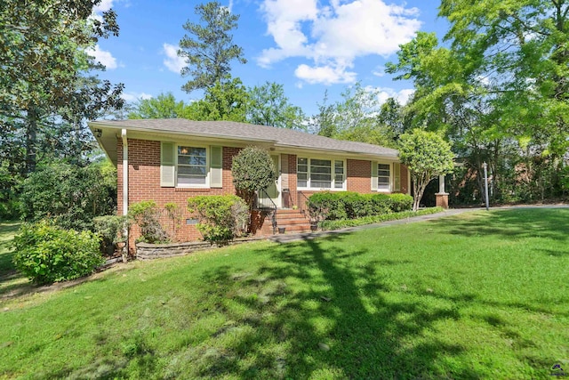 718 Dogwood Cir, Macon, GA 31210 - ranch-style house featuring a front lawn and brick siding
