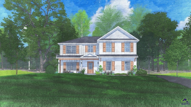 traditional-style house with a front yard