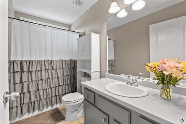 full bath with toilet, vanity, visible vents, tile patterned flooring, and a shower with shower curtain
