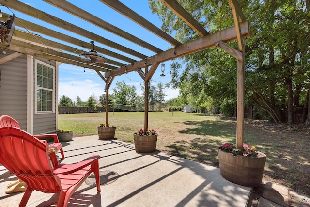 view of patio / terrace featuring a pergola and fence
