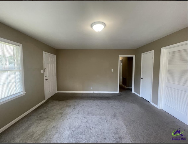 1575 Winston Dr, Macon, GA 31206 - carpeted spare room featuring baseboards