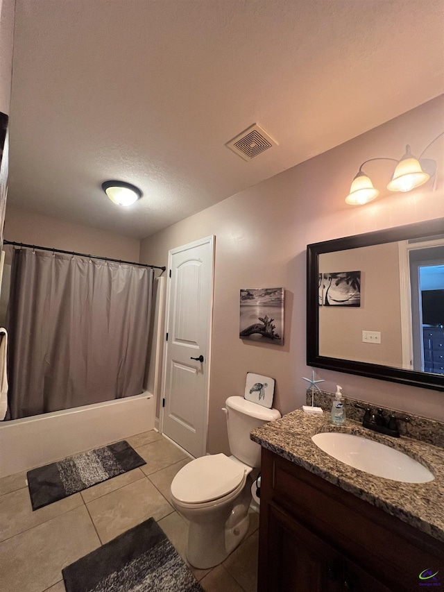 full bath featuring toilet, tile patterned flooring, and vanity